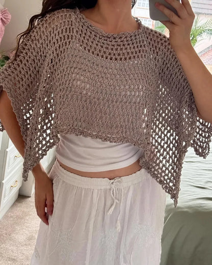 Selenya crochet shawl poncho styled over a dress