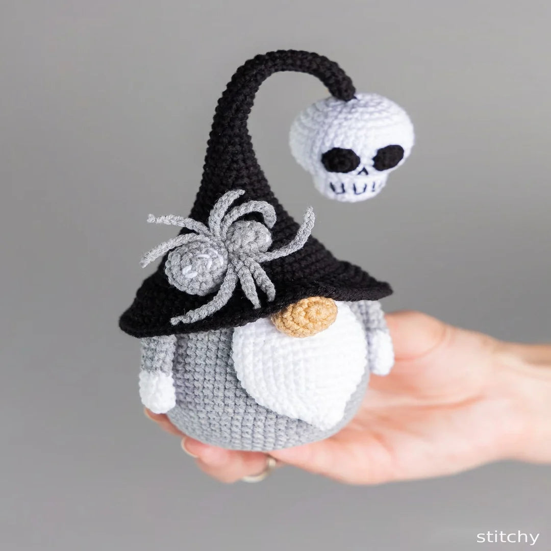 Close-up of the crocheted spider on the Halloween gnome